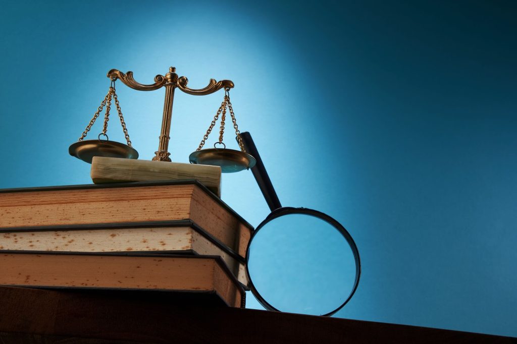 Judge's scales and books with divorce laws